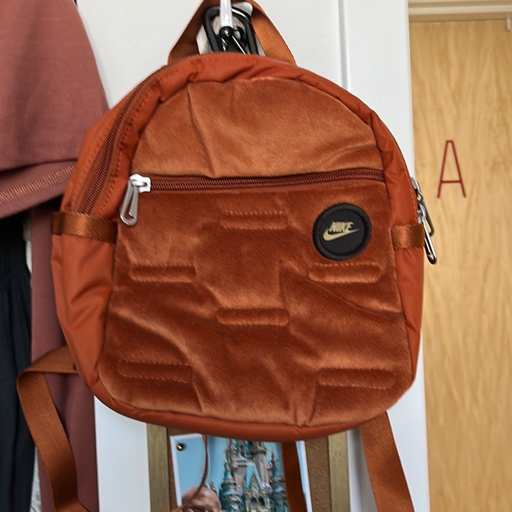 Nike orange mini backpack